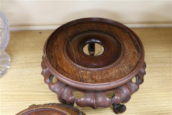 Two Chinese hardwood stands largest 20cm diameter